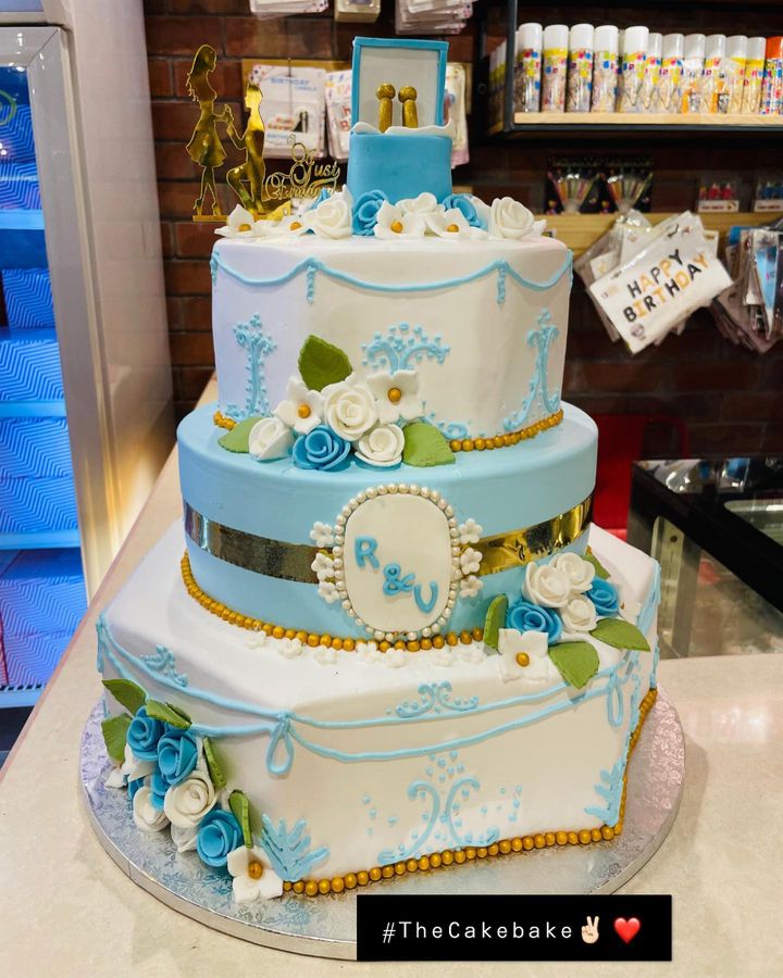 Blue and White Design Engagement Cake